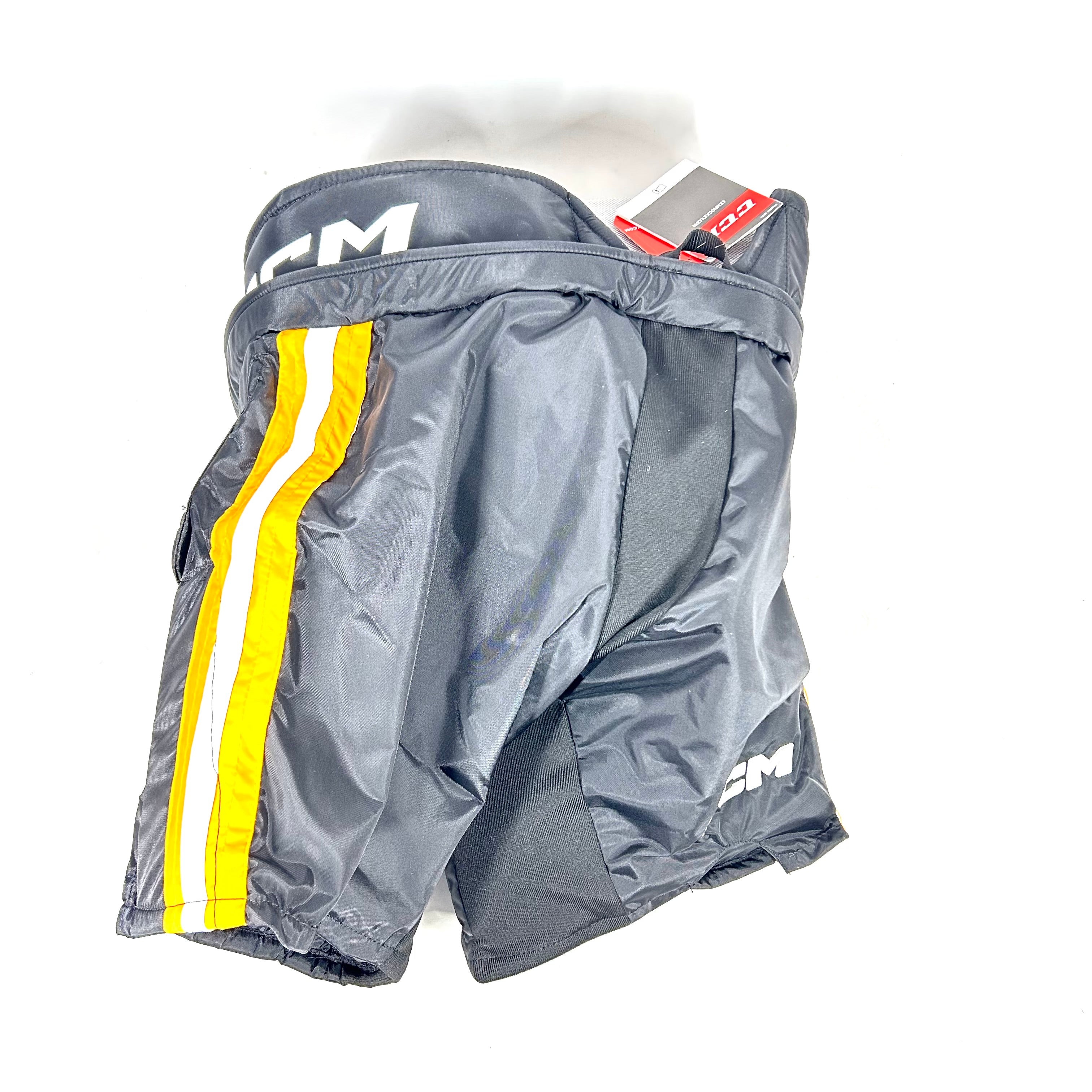 CCM HPG12A - Pantalon de gardien de but de hockey Pro Stock (noir/blanc/jaune)